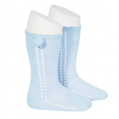 Calcetines altos perlé calado con pompón lateral AZUL BEBE