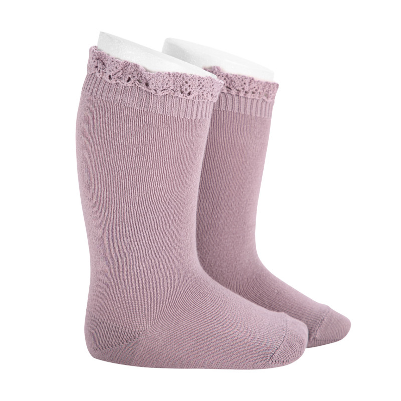 Chaussettes hautes unies avec dentelle sur bordure